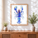 Finished a blue lobster cross stitch artwork displayed