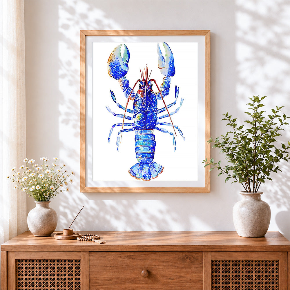 Finished a blue lobster cross stitch artwork displayed