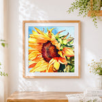 Finished a golden sunflower in watercolour cross stitch artwork displayed
