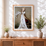 Finished abstract angel with white wings cross stitch artwork displayed