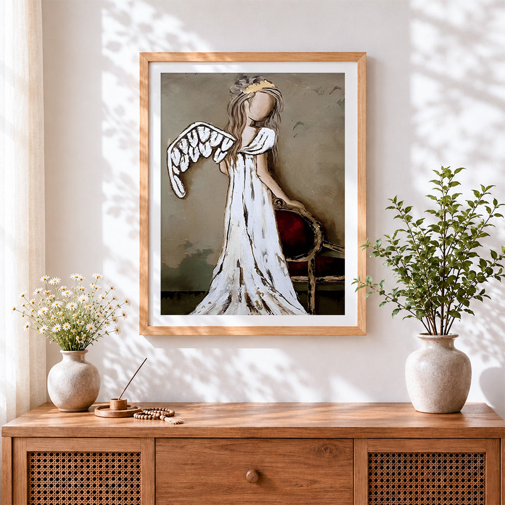Finished abstract angel with white wings cross stitch artwork displayed