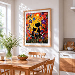 Abstract black cats and flowers cross stitch artwork displayed on wall as home decor