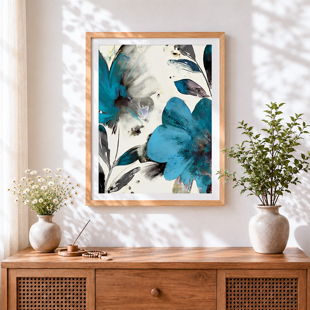 Finished abstract blue and grey flowers cross stitch artwork displayed