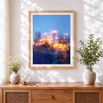 Finished abstract city lights cross stitch artwork displayed
