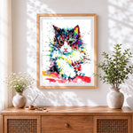 Finished abstract colourful cat cross stitch artwork displayed