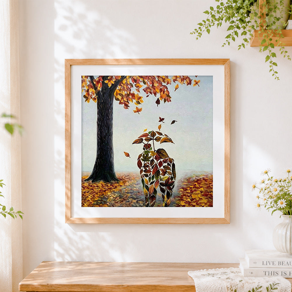 Finished abstract couple made of autumn leaves cross stitch artwork displayed