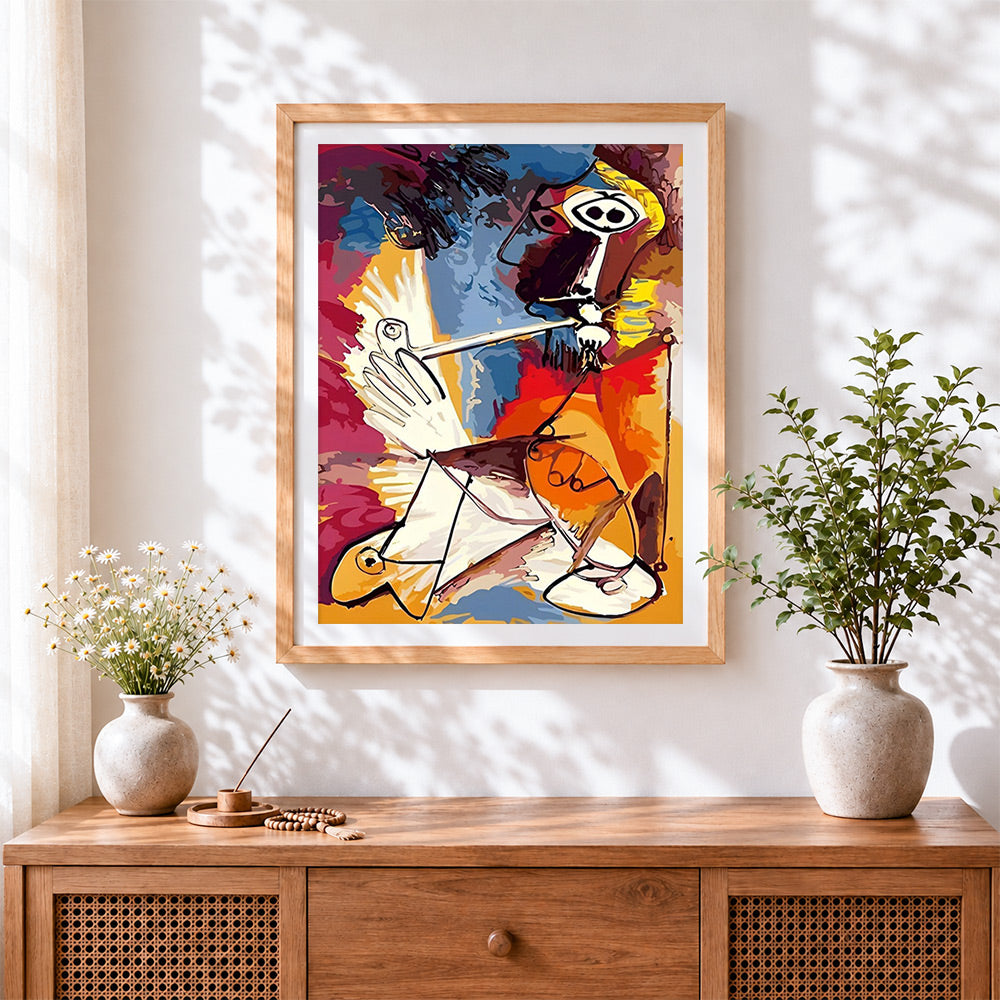 Finished abstract cubist figure cross stitch artwork displayed