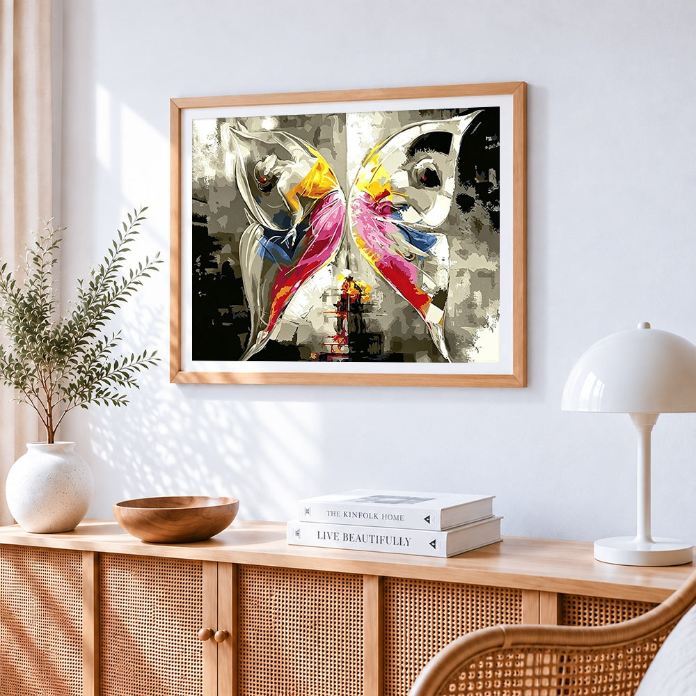 Abstract dancers in yellow and pink paint by numbers artwork displayed on wall as home decor
