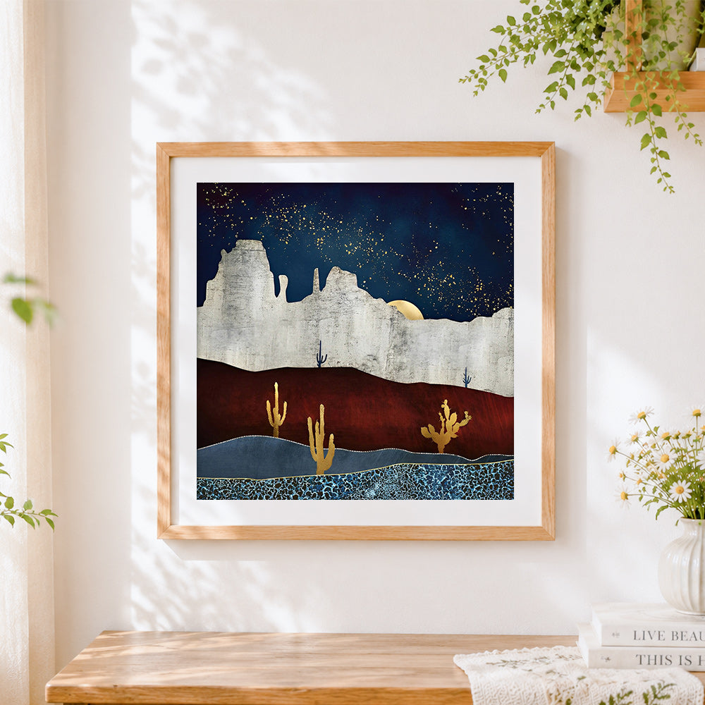 Finished abstract desert and starry sky cross stitch artwork displayed