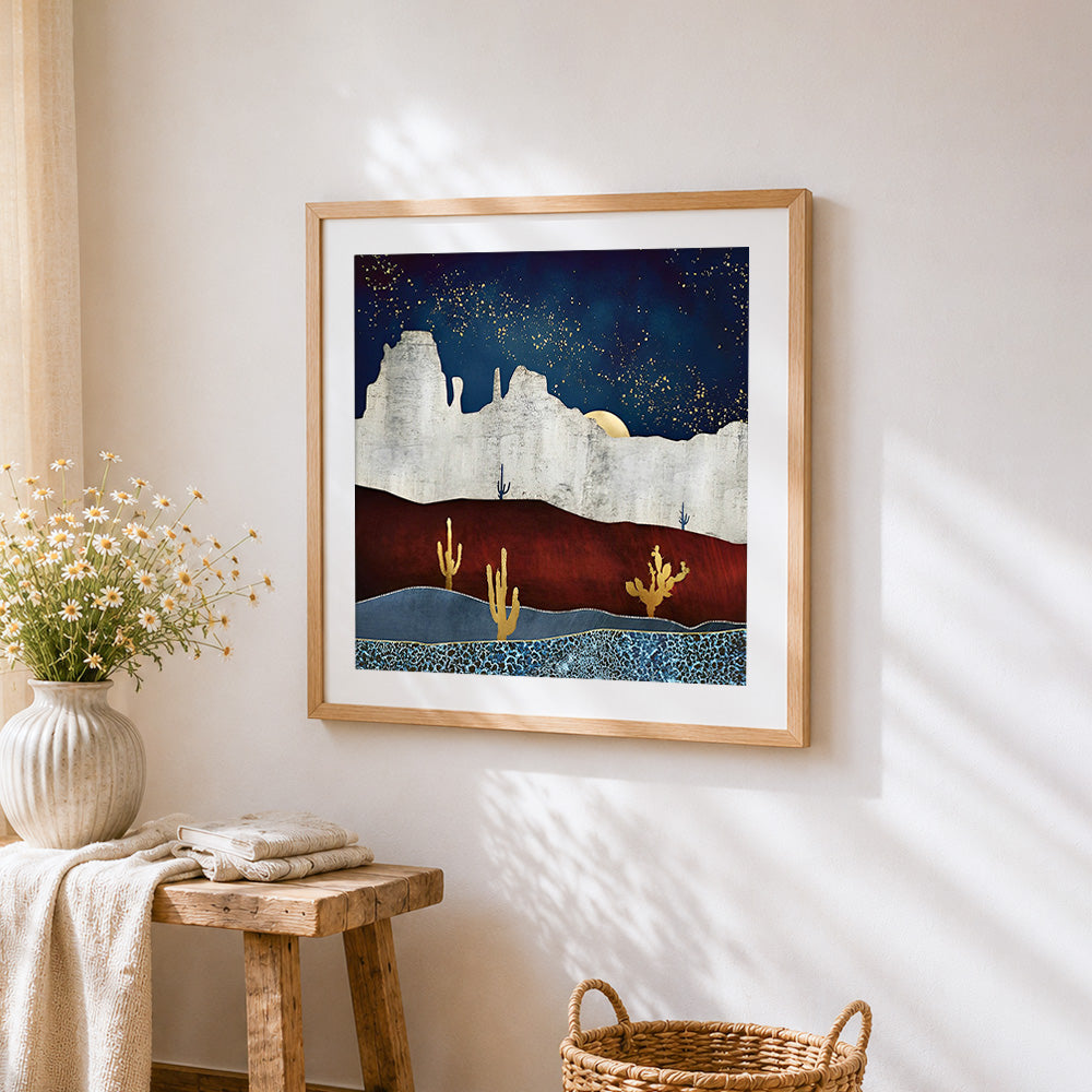 Abstract desert and starry sky cross stitch artwork displayed on wall as home decor
