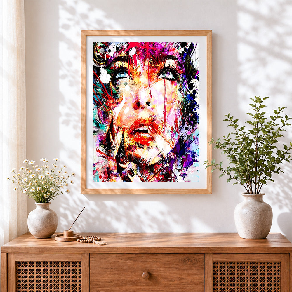Finished abstract explosion of colour face cross stitch artwork displayed