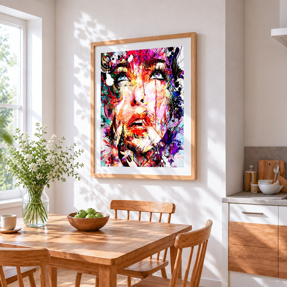 Abstract explosion of colour face cross stitch artwork displayed on wall as home decor