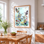 Abstract floral rabbits cross stitch artwork displayed on wall as home decor