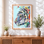 Finished abstract floral tiger cross stitch artwork displayed