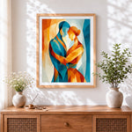Finished abstract geometric couple cross stitch artwork displayed