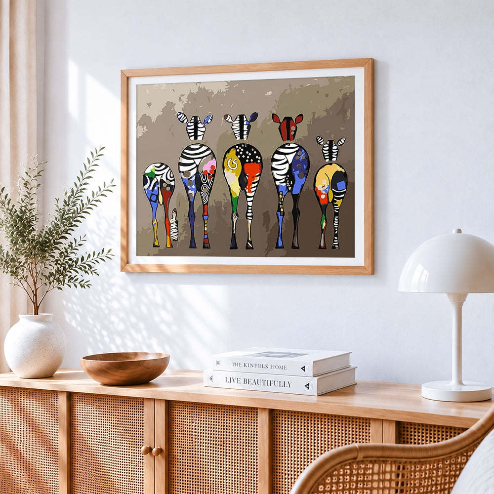 Abstract geometric zebras cross stitch artwork displayed on wall as home decor