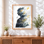 Finished abstract leaf silhouette cross stitch artwork displayed
