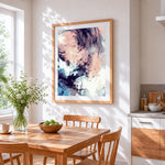Abstract pastel cloud cross stitch artwork displayed on wall as home decor