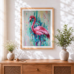 Finished abstract pink flamingo cross stitch artwork displayed