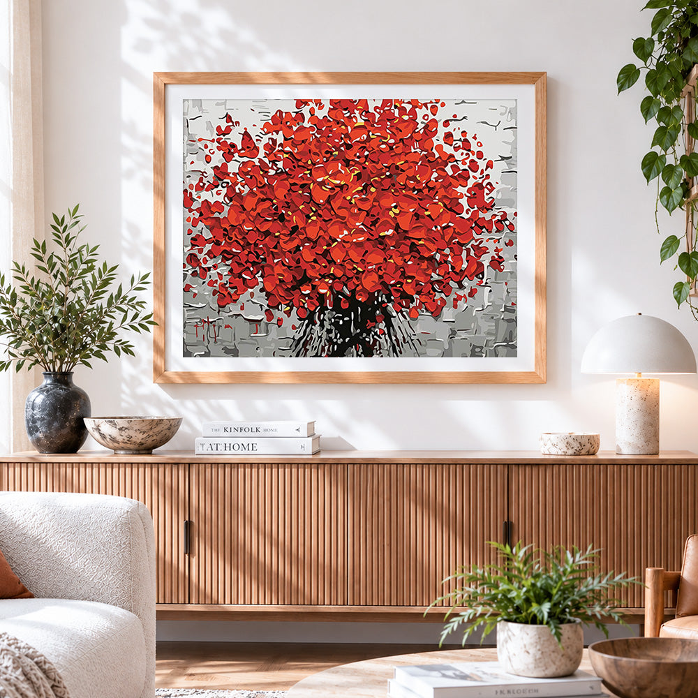 Finished abstract red tree on grey background paint by numbers artwork displayed as home decor