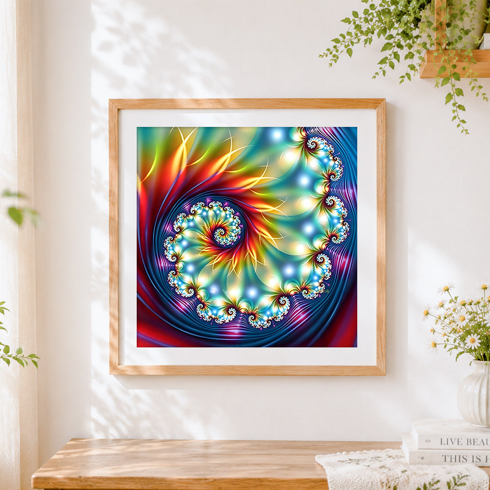 Finished abstract spiral kaleidoscope cross stitch artwork displayed