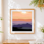 Finished abstract sunset mountains cross stitch artwork displayed