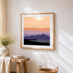 Abstract sunset mountains cross stitch artwork displayed on wall as home decor