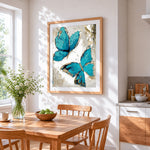 Abstract teal butterflies cross stitch artwork displayed on wall as home decor