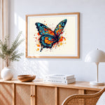 Abstract watercolour butterfly with splashes cross stitch artwork displayed on wall as home decor