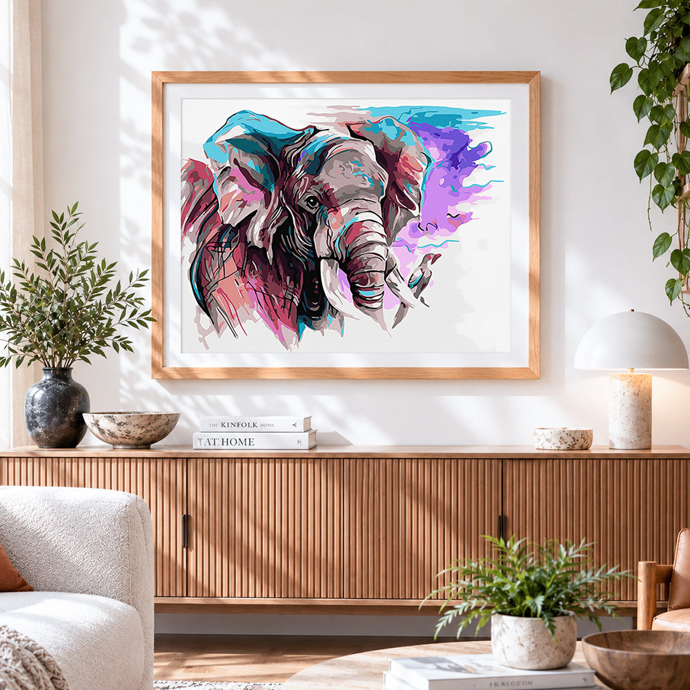 Finished abstract watercolour elephant cross stitch artwork displayed