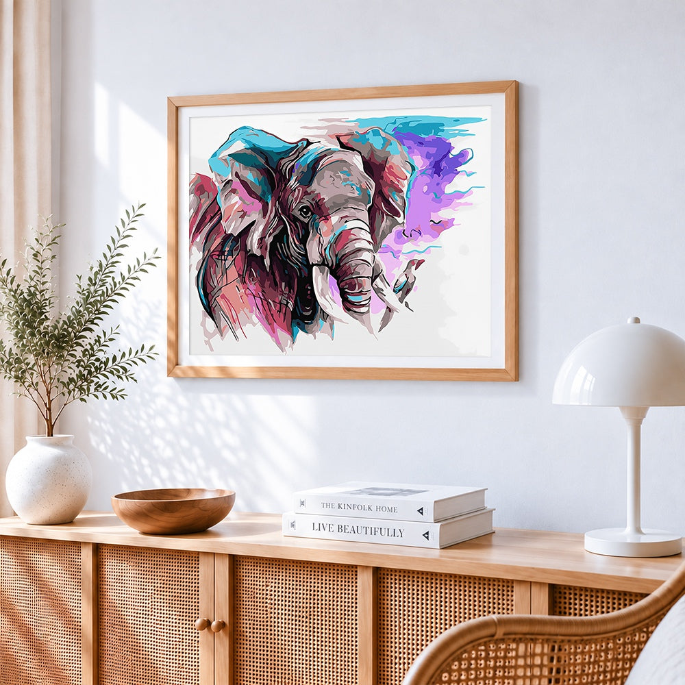 Abstract watercolour elephant cross stitch artwork displayed on wall as home decor
