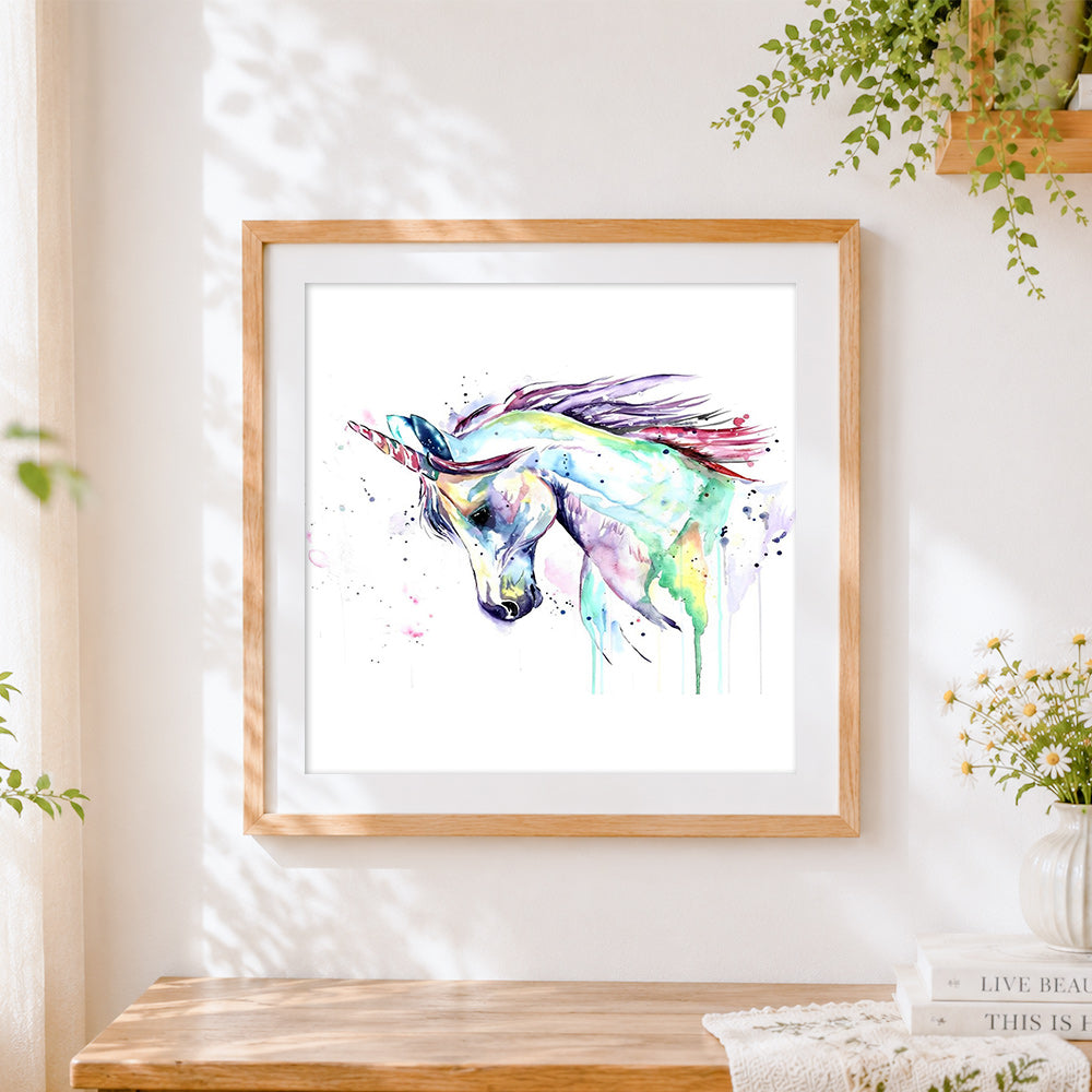 Finished abstract watercolour unicorn cross stitch artwork displayed