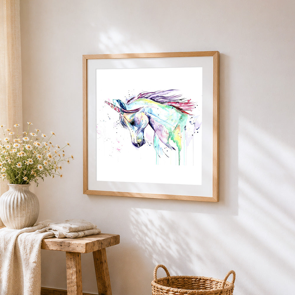 Abstract watercolour unicorn cross stitch artwork displayed on wall as home decor
