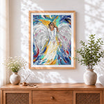 Finished abstract white angel cross stitch artwork displayed