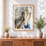 Finished abstract white horse cross stitch artwork displayed