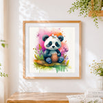 Finished adorable baby panda with a butterfly cross stitch artwork displayed