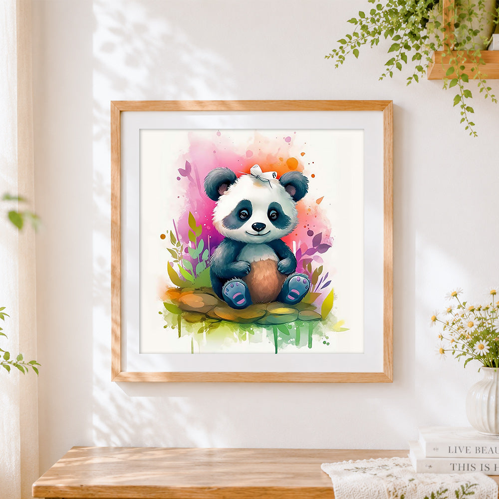 Finished adorable baby panda with a butterfly cross stitch artwork displayed