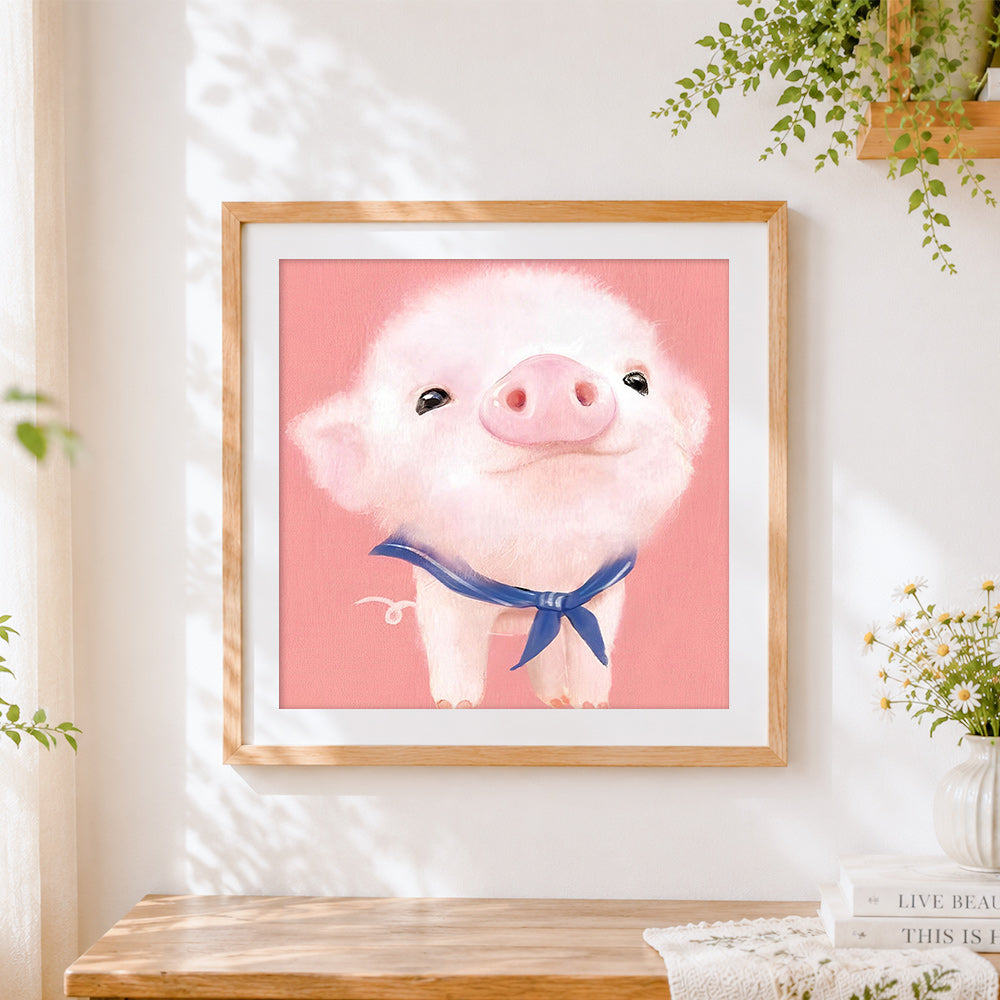Finished adorable fluffy pig with blue bow cross stitch artwork displayed