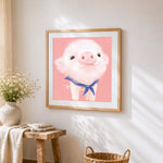 Adorable fluffy pig with blue bow cross stitch artwork displayed on wall as home decor