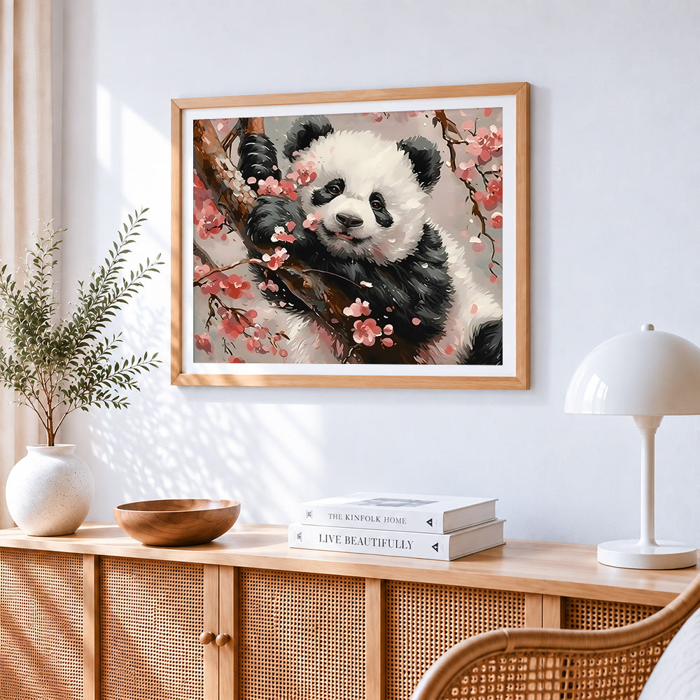 Adorable panda in cherry blossoms paint by numbers artwork displayed on wall as home decor