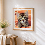 Adorable tabby kitten in orange pots paint by numbers artwork displayed on wall as home decor