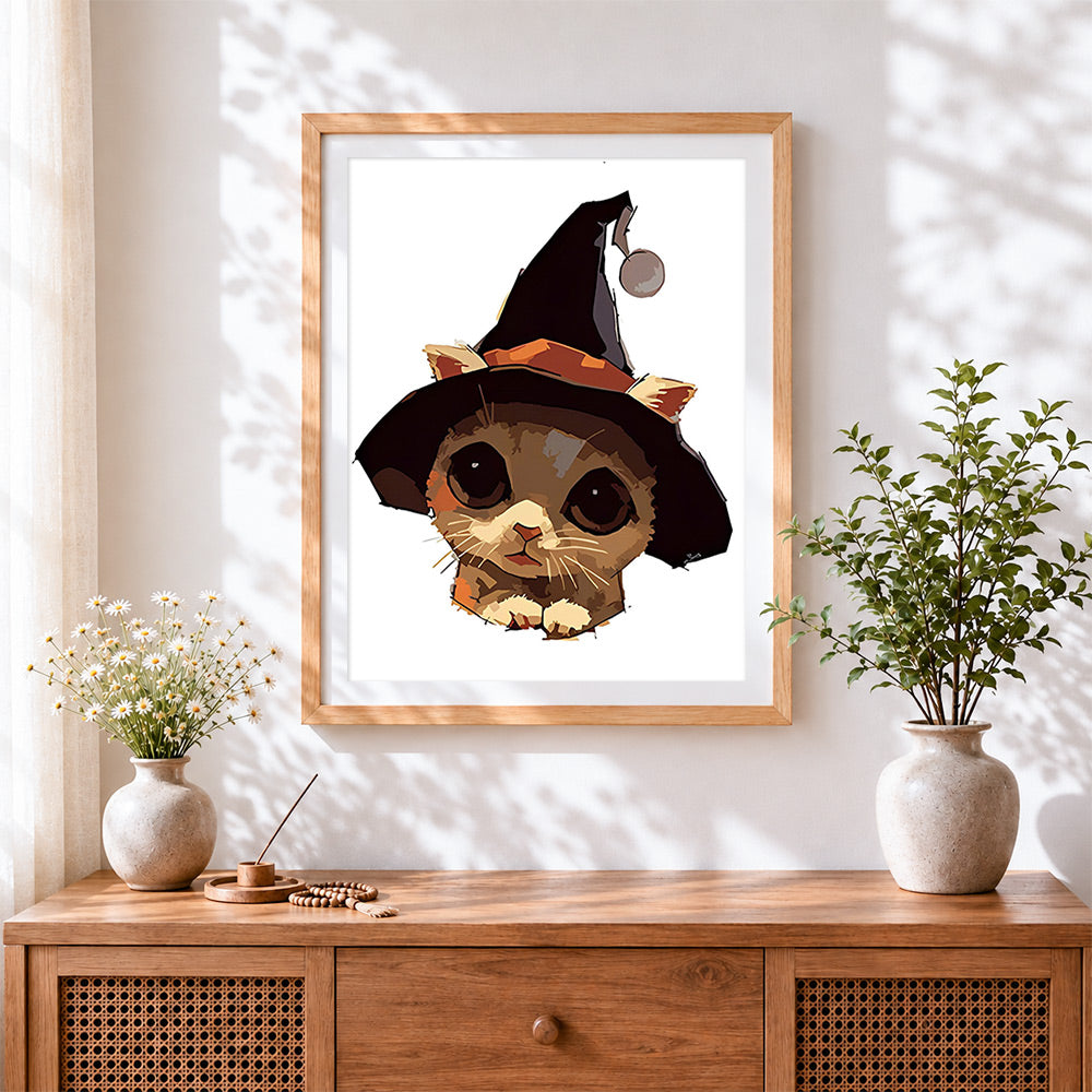 Finished adorable witchy kitty cross stitch artwork displayed
