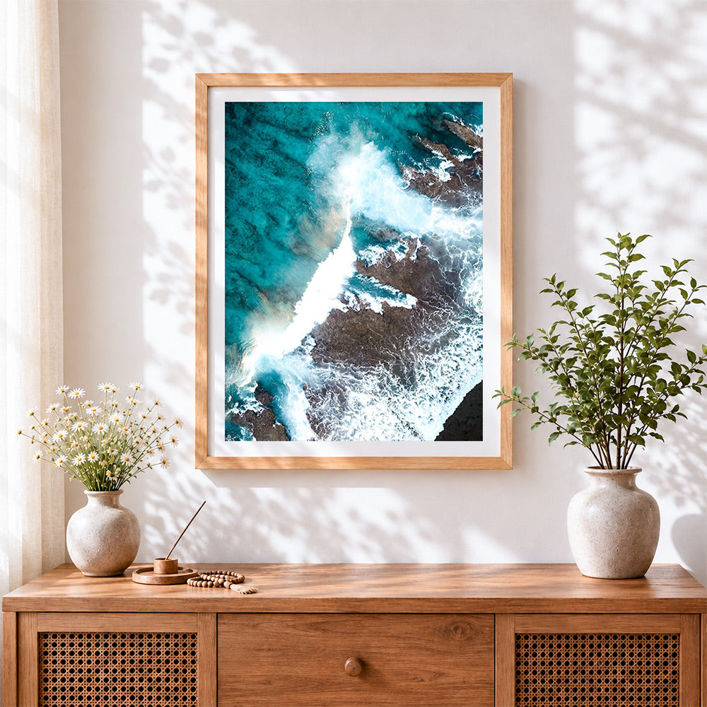Finished aerial view of the sea cross stitch artwork displayed