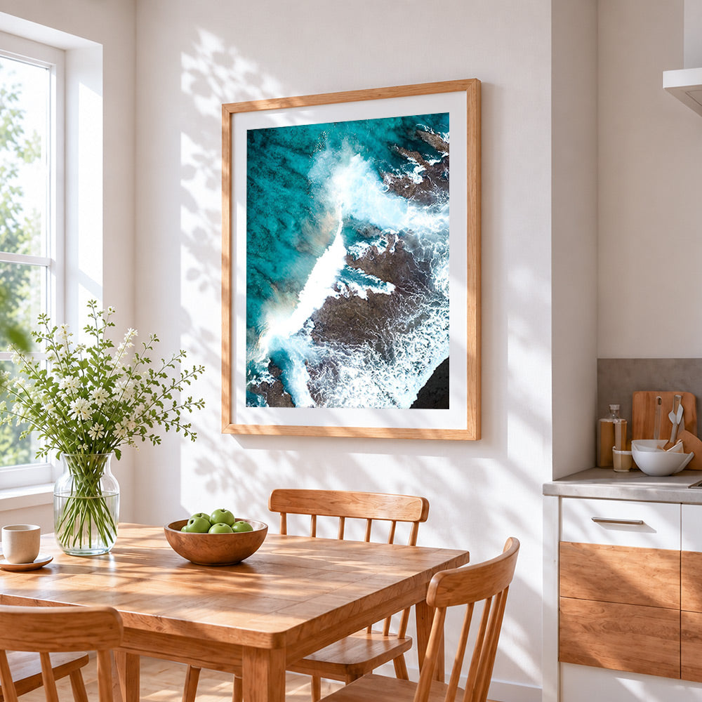 Aerial view of the sea cross stitch artwork displayed on wall as home decor