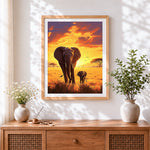 Finished african elephants at sunset cross stitch artwork displayed