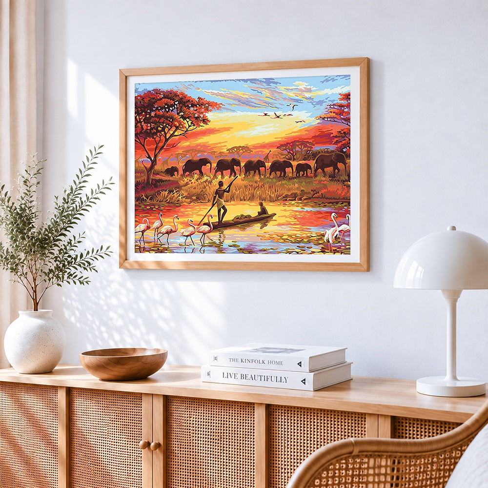 African river canoes and elephant herds cross stitch artwork displayed on wall as home decor