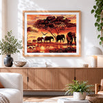 Finished african sunset elephant family cross stitch artwork displayed