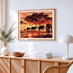 African sunset elephant family cross stitch artwork displayed on wall as home decor