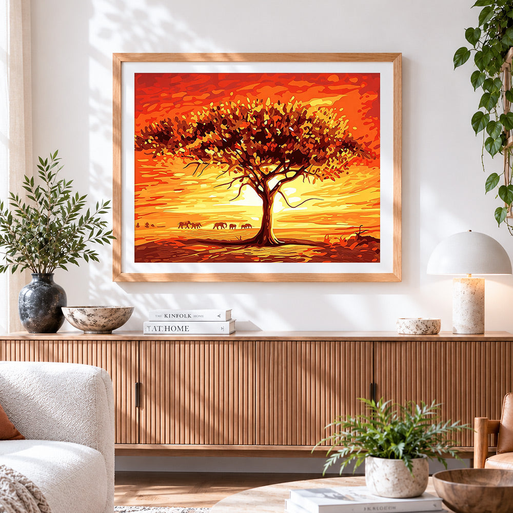 Finished african sunset with acacia tree and elephants cross stitch artwork displayed