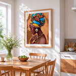 African woman with colourful headwrap cross stitch artwork displayed on wall as home decor